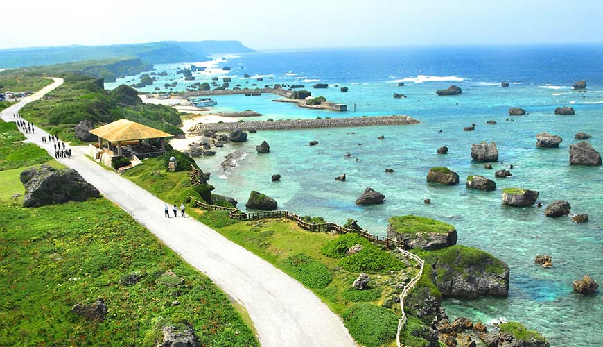 people walking down the coast in Okinawa Japan