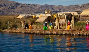 Locals on the reed islands of Lake Titicaca Locals on the reed islands of Lake Titicaca