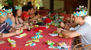 A group enjoying a Christmas dinner together on a Tucan Travel tour