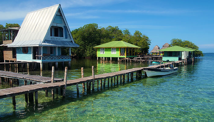 houses by water in panama, one of the best places to travel in february
