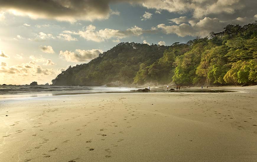 snorkelling in cahuita national park in costa rica on a beautiful beach