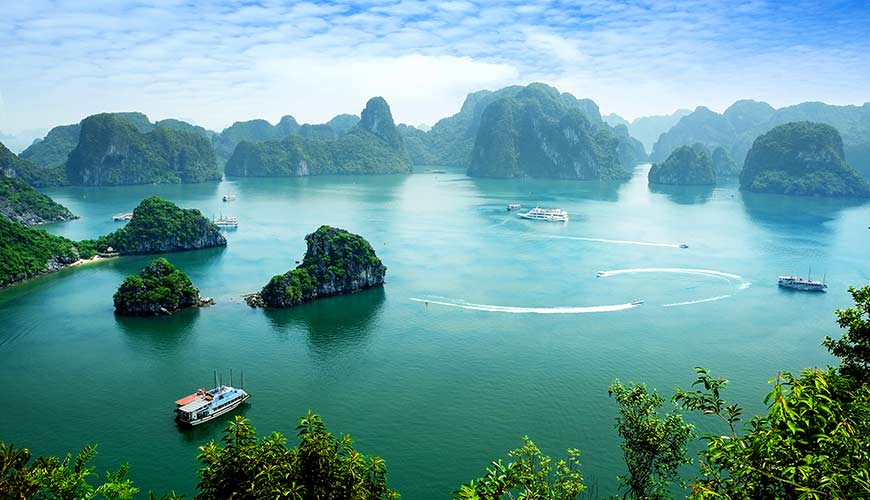 Boat cruise through Halong Bay Vietnam Asia