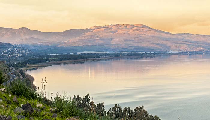 view of sunset overlooking the sea of galilee, one of the best things to do in Israel