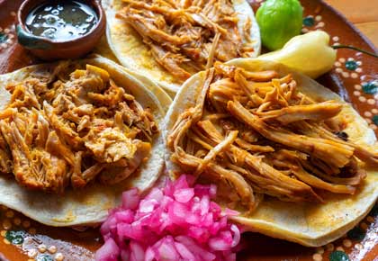 cochinita pibil are a great cuisine found in Mexico and a very filling dish worth tasting whilst travelling the country on holiday