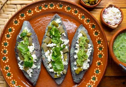 Tlacoyos are a cuisine found in Mexico and worth tasting whilst travelling the country on holiday
