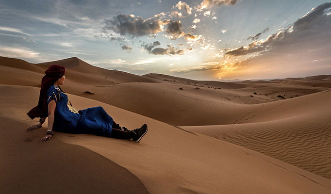 Girl enjoying the view in Sahara Desert