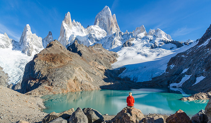 Traveller enjoying the rewarding view after a day of hiking in Patagonia