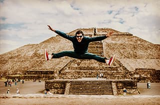 Young male traveller enjoying the pyramids of Teotihuacan in Mexico Central America, southernmost, north America, Mexico, South America, Panama, Costa Rica, Nicaragua, Honduras, El Salvador, Guatemala, Belize, solo woman, solo traveller, vacation, holidays