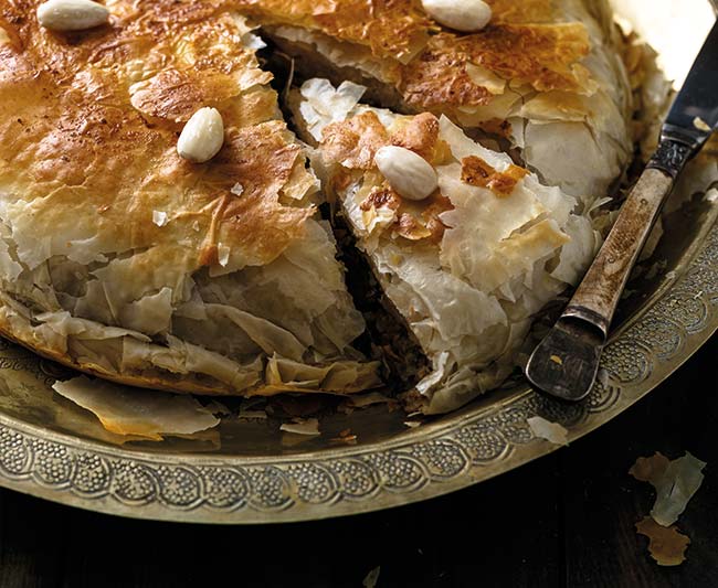 Crusty pie with chicken, close view, arabian style