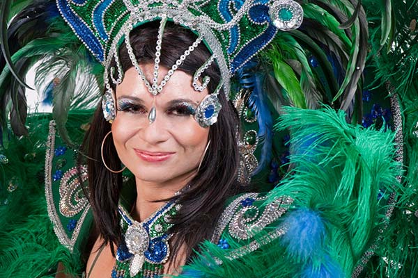 Carnival, Rio de Janeiro brazilian woman dressed in green and blue costume for rio carnival