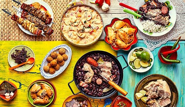 spread of brazilian food on a table