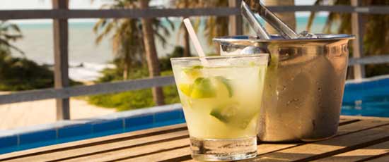 A very popular cocktail which has made its way around the world that originates from brazil in the caipirinha