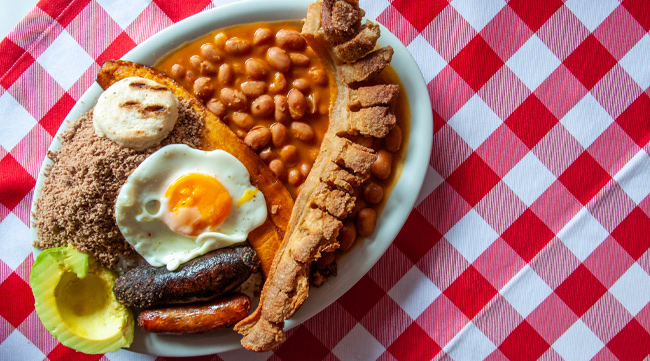 Order a plate of bandeja paisa to discover what makes this filling Colombian classic so popular