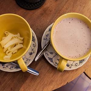 chocolate con quesco hot chocolate and cheese popular colombian food