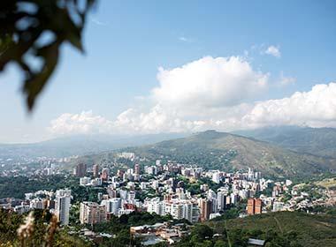 city of cali set amidst the rolling green hills in colombia best places to visit in colombia