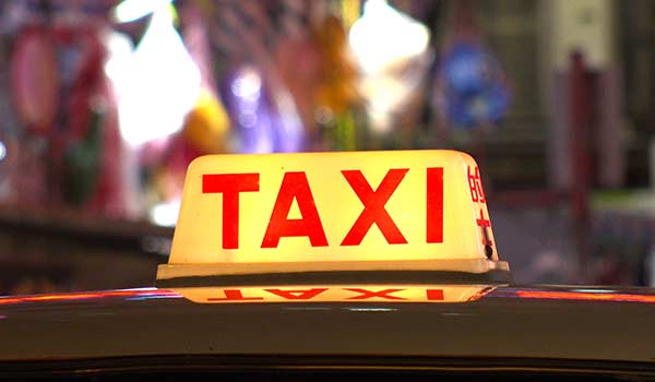 Taxi in Costa Rica A red taxi with a yellow light in Costa Rica