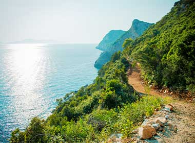 One of the walking trails that you can find on Sipan Island, with lovely views of the sea