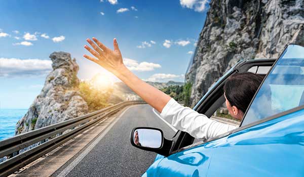Hiring a car in Croatia An image showing travellers enjoying driving through Croatia in a private car hire