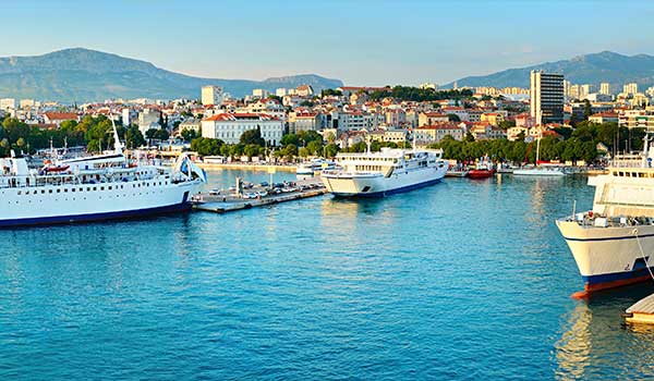 Ferries are the only way to travel to the islands in Croatia An image showing the Split harbour with ferries docked