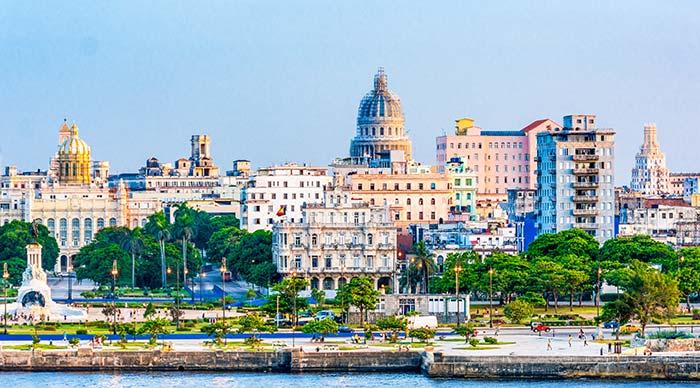 Skyline of Havana, Cuba skyline of havana along the sea front with trees and buildings on group tour of Cuba