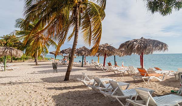 Playa Ancon, Cuba playa ancon is one of cubas best beaches with umbrellas sun loungers and palm trees