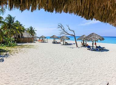 best beaches in cuba sun umbrellas and white sand in varadero cuba