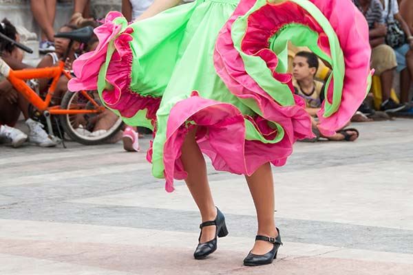 International Cuban Dance Festival, Havana cuban woman wearing traditional salsa dress for cuban dance festival in havana