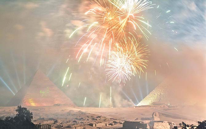 Fireworks at the Great Pyramids of Giza fireworks at the great pyramids of giza for the uprising of 2011 celebration