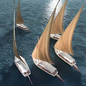 Felucca boats sailing down the river Nile a group of felucca boats sailing on the river nile in egypt during summer