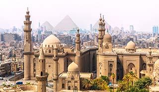 Giza, Egypt the dusty city of Giza with the pyramids in the background in egypt