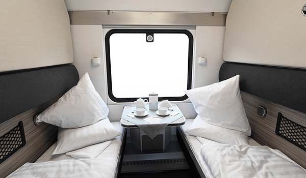 Travelling by overnight train in Egypt beds and coffees in a cabin on an overnight train in egypt