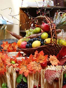 harvest offerring of fruit and vegetables with autumn leaves for festival in tbilisi georgia