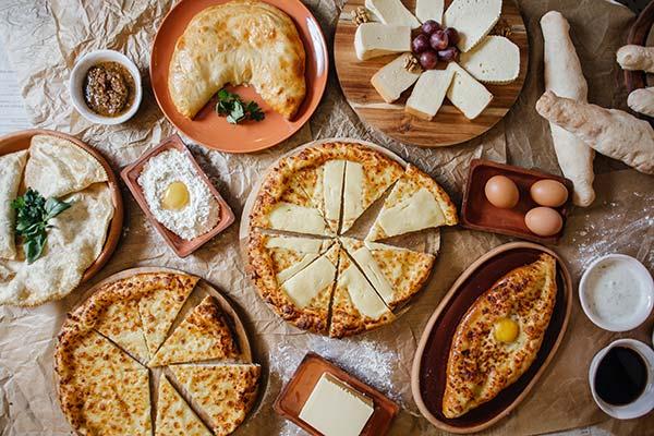 Traditional Georgian feast typical dinner table in georgia with bread cheese eggs