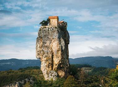 monestary on top of high katskhi pillar in georgia