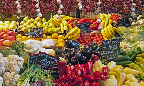 Vegetables at a market in Budapest image showing a vegetable stand in a market in Budapest