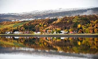 Ayureki in Autumn, Iceland ayureki in autumn trees lining the lake and reflecting in the water