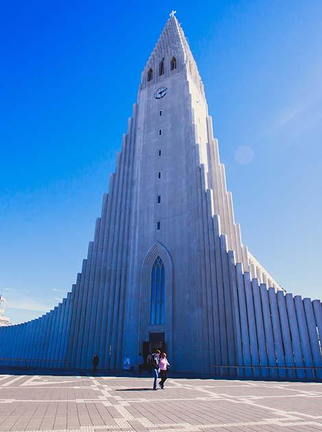 Hallgrimskirkja Cathedral, Reykjavik, Iceland clear blue sky above hallgrimskirkja cathedral in reykjavik iceland lutheran parish church