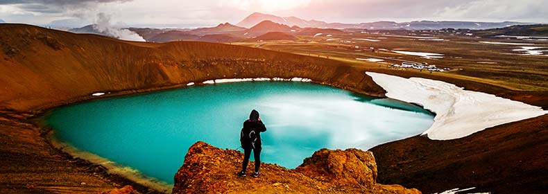 explore blue water and beautiful landscapes of lake myvatn on a group tour to iceland