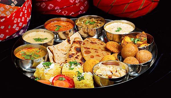 a popular thing to eat in india is a thali