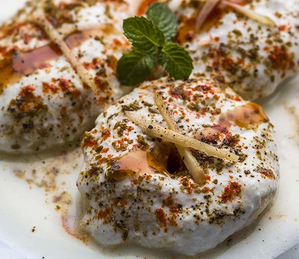 Dahi Vada, traditional Indian food best food to try in india is a tasty sweet of dahi vada