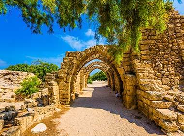 sunny day at arched passage covered street ruins of ancient seaport caesarea israel