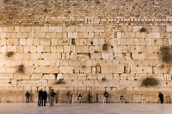 people praying at the western wall in jerusalem israel