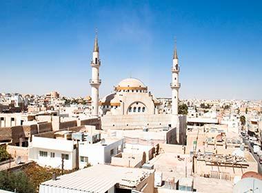 city skyline and golden mosque in madaba on a group tour to madaba