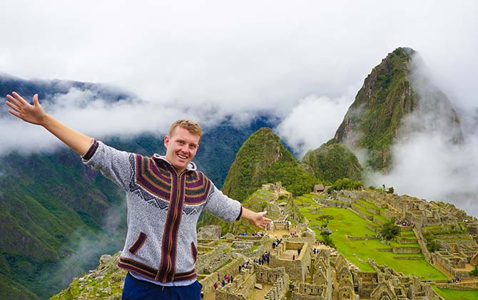 Solo adventure traveller exploring Machu Picchu Travel Advice blog for group or solo adventure seekers looking to explore Machu Picchu on a holiday tour