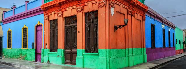 Vibrant streets of Callao tour group on holiday are taken by a tour guide through the vibrant streets of callao in lima