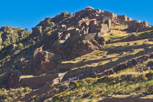 when hiking through the mountain range on the many trails near machu picchu pisac village is a wonderful cultural experience