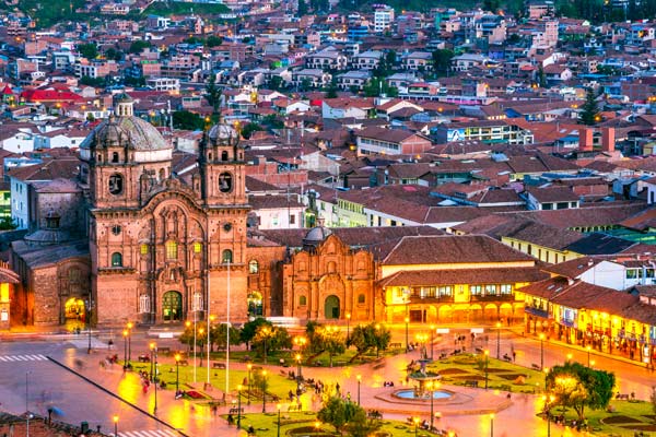 Plaza de Armas travel group visits cusco of a holiday trip through peru where they will visit machu picchu