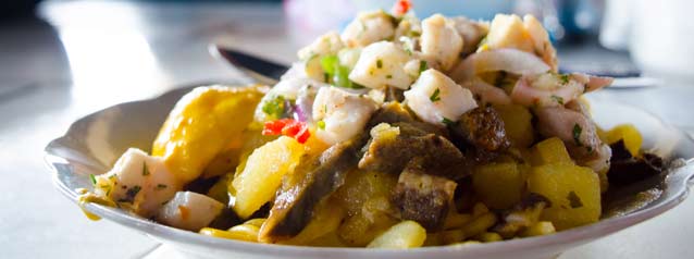 Traditional dish at the San Pedro Market Taste some of the most culturally amazing travel food when on a holiday tour in peru and eat like a local in the san pedro market