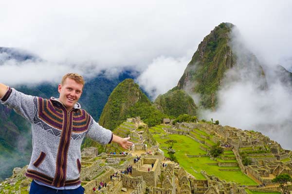 Solo travel tourist at Machu Picchu solo travel groups visit machu picchu after completing the inca trail with one of our holiday travel groups