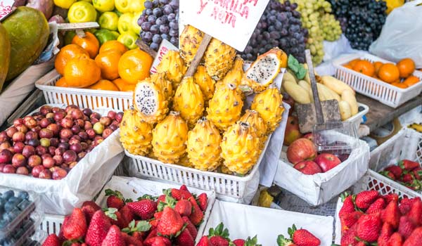 A market stall in Peru selling a range of local fresh fruits A market stall in Peru selling a range of fruits